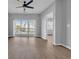 Bright living space with sliding glass doors leading to outdoor balcony at 901 West Port Dr. # 1706, North Myrtle Beach, SC 29582