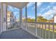 Comfortable screened-in porch with plenty of natural light and pleasant outdoor views at 901 West Port Dr. # 1706, North Myrtle Beach, SC 29582