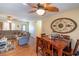 Bright dining area with wooden table and chairs, adjacent to living room at 1020 Thomas Ave., North Myrtle Beach, SC 29582