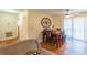 Dining area with wooden table and chairs, near the kitchen at 1020 Thomas Ave., North Myrtle Beach, SC 29582