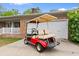 Home exterior featuring a red golf cart on the driveway at 1020 Thomas Ave., North Myrtle Beach, SC 29582