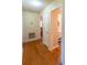 Light-filled hallway connecting bedrooms and bathroom at 1020 Thomas Ave., North Myrtle Beach, SC 29582