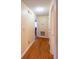 Hardwood floors in a long hallway with access to bedrooms and bath at 1020 Thomas Ave., North Myrtle Beach, SC 29582