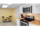 Bright kitchen features stainless appliances, wood countertops, and white cabinetry at 1020 Thomas Ave., North Myrtle Beach, SC 29582