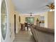 Bright living room with laminate flooring, neutral walls, and a smooth transition into the dining area at 1020 Thomas Ave., North Myrtle Beach, SC 29582