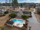 Aerial view showcasing the home and pool at 103 Lakeside Dr., Tabor City, NC 28463