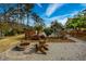 Relaxing fire pit area next to the pool at 103 Lakeside Dr., Tabor City, NC 28463