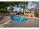 Refreshing pool with adjacent spa and pool house, great for entertaining at 103 Lakeside Dr., Tabor City, NC 28463