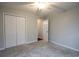 Well lit bedroom with double door closet at 1047 Rose Haven Dr., Conway, SC 29527