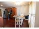 Bright kitchen nook with wood table and window seat at 1047 Rose Haven Dr., Conway, SC 29527