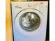 White front-load washer with various wash cycles at 105 S Merriman Rd., Georgetown, SC 29440