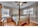 Spacious bedroom with hardwood floors and a wooden bed frame at 1100 Naomi Ave., Conway, SC 29526