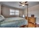 Charming bedroom with hardwood floors and a wooden dresser at 1100 Naomi Ave., Conway, SC 29526