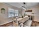 Farmhouse-style dining room with a large table and bench at 1100 Naomi Ave., Conway, SC 29526