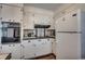 White kitchen with built-in oven and microwave at 1100 Naomi Ave., Conway, SC 29526