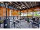 Relaxing screened porch with seating and ceiling fan at 1100 Naomi Ave., Conway, SC 29526