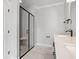 Modern bathroom with tiled shower and quartz countertop at 1201 Possum Trot Rd., North Myrtle Beach, SC 29582
