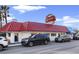 Exterior view of Hoskins Restaurant with red roof, parking and surrounding businesses at 1201 Possum Trot Rd., North Myrtle Beach, SC 29582