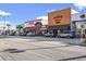 Street view featuring colorful storefronts of various restaurants and shops at 1201 Possum Trot Rd., North Myrtle Beach, SC 29582