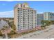 Oceanfront condo building, showing its side elevation and beach access at 1205 S Ocean Blvd. # 50412, Myrtle Beach, SC 29577
