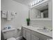 Bathroom with single sink vanity, toilet, and shower/tub combo at 1205 S Ocean Blvd. # 50412, Myrtle Beach, SC 29577