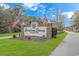 Entrance to Carolina Shores North community with brick signage at 121 Crossroad Dr. Nw, Calabash, SC 28467