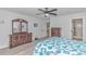 Spacious main bedroom with hardwood floors and ensuite bath at 121 Crossroad Dr. Nw, Calabash, SC 28467