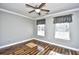 Spacious bedroom with wood floors and ceiling fan at 1288 Brighton Ave., Myrtle Beach, SC 29588