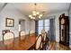 Formal dining room featuring hardwood floors and large windows at 1288 Brighton Ave., Myrtle Beach, SC 29588