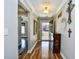 Bright entryway with hardwood floors and decorative console table at 1288 Brighton Ave., Myrtle Beach, SC 29588