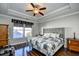 Large main bedroom with ceiling fan and hardwood floors at 1288 Brighton Ave., Myrtle Beach, SC 29588