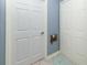 Clean hallway with two white doors at 1392 Southwood Dr., Surfside Beach, SC 29575