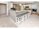 Kitchen with granite countertop breakfast bar and white cabinets at 1392 Southwood Dr., Surfside Beach, SC 29575