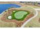 Overhead view of a well-maintained golf course surrounded by lush landscaping at 1410 Saw Palmetto St., North Myrtle Beach, SC 29582