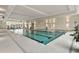 Bright indoor pool with clear water, marked lanes, and ample natural light at 1410 Saw Palmetto St., North Myrtle Beach, SC 29582