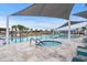 Resort-style pool and spa with shade structures at 1410 Saw Palmetto St., North Myrtle Beach, SC 29582