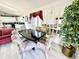 Dining area with black table and patterned chairs at 1524 S Ocean Blvd. S # Penthouse, North Myrtle Beach, SC 29582