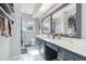 Bathroom with double vanity, large mirror and tile flooring at 1530 Deer Park Ln., Surfside Beach, SC 29575