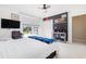 Main bedroom with TV, closet and window at 1530 Deer Park Ln., Surfside Beach, SC 29575