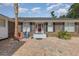 Inviting front entrance with red door and brick facade at 1530 Deer Park Ln., Surfside Beach, SC 29575