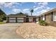 Brick paved patio with double garage and palm trees at 1530 Deer Park Ln., Surfside Beach, SC 29575