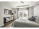 Bright bedroom with dresser and large windows at 1810 N Cove Ct., North Myrtle Beach, SC 29582