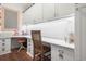 Bright home office features built-in cabinets and a pegboard wall at 1810 N Cove Ct., North Myrtle Beach, SC 29582