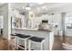 Modern kitchen with island seating and stainless steel appliances at 1810 N Cove Ct., North Myrtle Beach, SC 29582