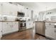 Modern kitchen with stainless steel appliances and granite countertops at 1810 N Cove Ct., North Myrtle Beach, SC 29582