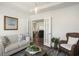 Bright living room with french doors leading to Gathering room at 1810 N Cove Ct., North Myrtle Beach, SC 29582