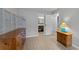 Bedroom with dresser, and view into bathroom at 1890 Colony Dr. # 17N, Myrtle Beach, SC 29575