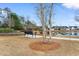 Peaceful park area with a bench near the pond at 1901-B High St., Myrtle Beach, SC 29577