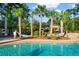 Relaxing pool area with hammocks and palm trees at 1901-B High St., Myrtle Beach, SC 29577