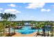 Expansive pool area overlooking a serene lake at 1901-B High St., Myrtle Beach, SC 29577